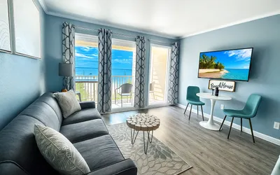 311 · Sophisticated Waterfront Getaway: Pool, Balcony, and Serene Views