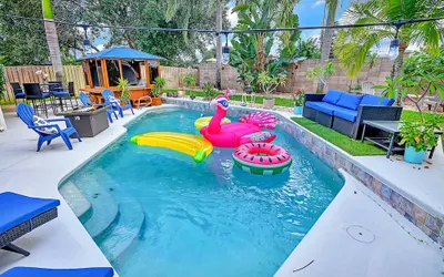 Urban Oasis W/hot Tub, Heated Pool And Private Movie Theater 2 Bedroom Home by RedAwning