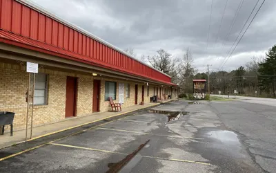 Queen Guest Room located at the Joplin Inn at the entrance to Mountain Harbor,, just 2 1/2 miles from Lake Ouachita. by RedAwning