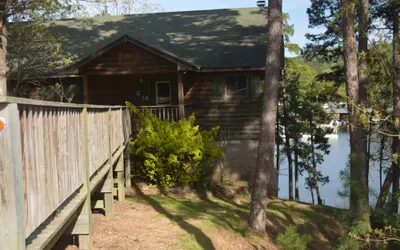 Two bedroom, two bath, log-sided, luxury Harbor North cottage overlooking Lake Ouachita. by RedAwning