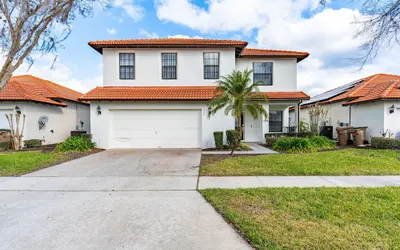 Poolside Serenity Near Disney World 4 Bedroom Home by RedAwning