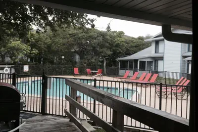 Photo 2 - Quaint condo with pool and across the street from Beach