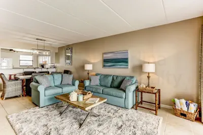 Photo 3 - Comfy Upper Unit Condo to Enjoy the Beach or the Fishing
