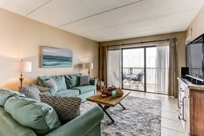 Photo 2 - Comfy Upper Unit Condo to Enjoy the Beach or the Fishing