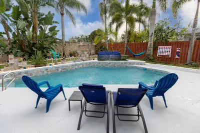 Photo 3 - Gorgeous Urban Oasis with Hot Tub, HEATED POOL and Private Movie Theater
