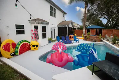 Photo 2 - Gorgeous Urban Oasis with Hot Tub, HEATED POOL and Private Movie Theater