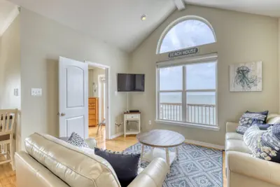 Photo 4 - Villa Delphinus - Beachfront! and Pet Friendly! Feel the ocean breezed and hear the waves lapping right at your doorstep!