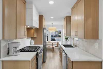 Photo 4 - One Block to Beach! 4BR w/ Game Room + Parking