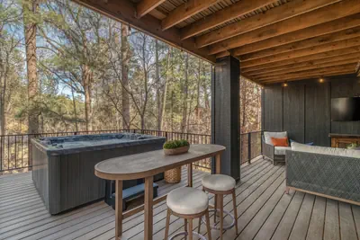 Photo 2 - Midtown Ruidoso Cabin | Riverfront • Hot Tub • Walkable