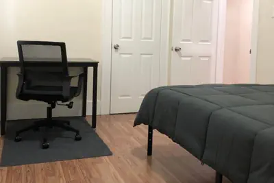 Photo 2 - Spacious and private apartment with 3 bedrooms and 1 bathroom near Newark International Airport EWR and New York City, MetLife Stadium FIFA World Cup 20 minutes away