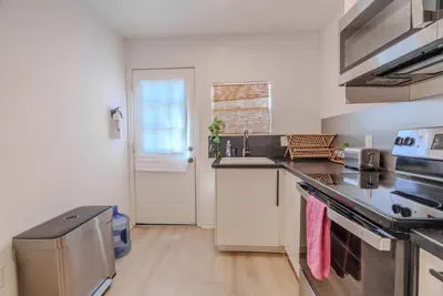 Photo 5 - Modern 3BR near downtown with fenced backyard