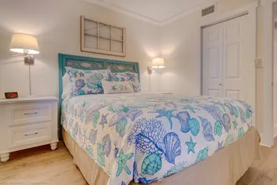Photo 3 - Ground-Floor Beachfront Condo! Pools and Free Beach Chairs