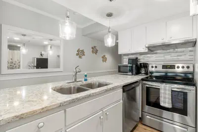 Photo 4 - Incredible Beachfront Corner Unit! Beach Chairs Service and Umbrella Included!
