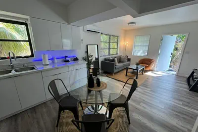 Photo 4 - Upstairs 2bed/1bath Apt w/parking near Coco Walk!