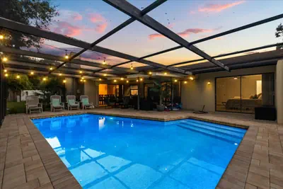 Photo 2 - Saltwater Pool Home | 4BR 9 Guests | Palm Harbor
