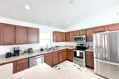 Photo 3 - Sleeps 7 | Pool + Lake Views | 3 King Beds