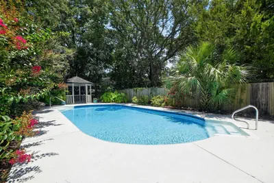 Photo 4 - 5BR Pool Home Near Beaches | Pet-Friendly + BBQ