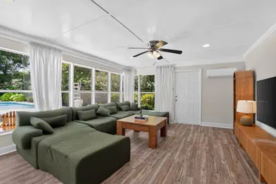 Photo 2 - 5BR Pool Home Near Beaches | Pet-Friendly + BBQ