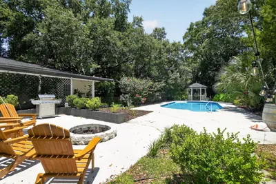 Photo 5 - 5BR Pool Home Near Beaches | Pet-Friendly + BBQ