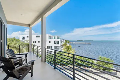 Photo 2 - New Oceanside Paradise with Pool and Waterfront Views!