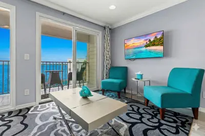 Photo 2 - Elegant Waterfront Condo with Heated Pool