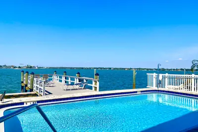 Photo 3 - 107 · Boat dock BBQ Walk to Beach Heated Pool
