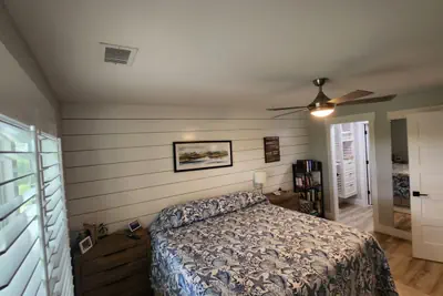 Photo 2 - Renovated King Bed Condo near beach with pool access.