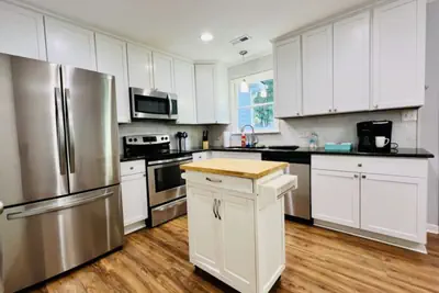 Photo 3 - Cozy Raleigh 3-Bed Home with Backyard & Grill