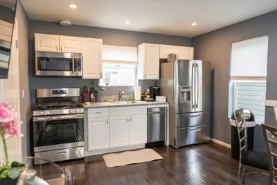 Photo 4 - Modern Comfort: 2BR Townhome w/ Private Patio p20