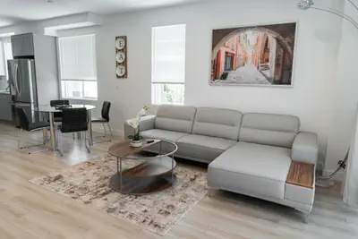 Photo 2 - MODERN 3-4 BEDROOM TOWNHOME BUILT IN 2023 WITH OFFICE, BONUS ROOM, 2-CAR GARAGE WITH EV CHARGER & 2 BALCONIES (p63)