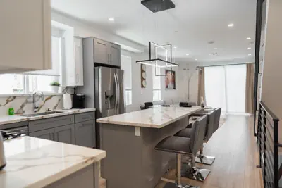 Photo 3 - MODERN 3-4 BEDROOM TOWNHOME BUILT IN 2023 WITH OFFICE, BONUS ROOM, 2-CAR GARAGE WITH EV CHARGER & 2 BALCONIES (p63)