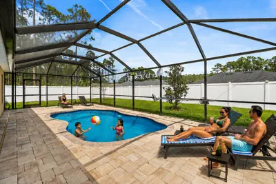 Photo 2 - Family Pool Retreat • Sleeps 10 • Near Beach • BBQ