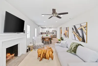 Photo 2 - Modern 3-Bed Gated Home 7 Min to Downtown Dallas | King Suite + Free Parking