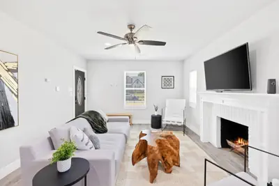 Photo 3 - Modern 3-Bed Gated Home 7 Min to Downtown Dallas | King Suite + Free Parking