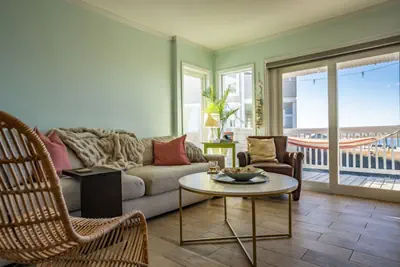 Photo 4 - Canal-Front Townhome | Private 30’ Boat Slip | Pool | 1-Min Walk to Beach