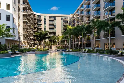 Photo 2 - Upscale Condo Balcony w/ Pool View/ Garage Parking/ Smart TV/ Wifi/ Pet Friendly