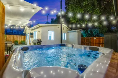 Photo 3 - Modern Cottage, Jacuzzi, Bistro Patio, Putting Green, Walk to All!