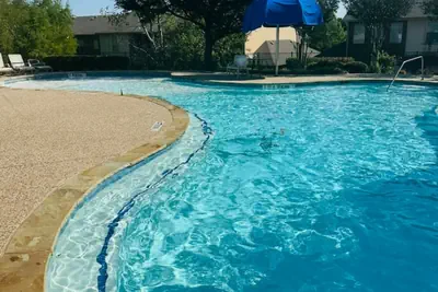 Photo 3 - DFW Retreat w/ Pool | 5 Min to Airport | Sleeps 6