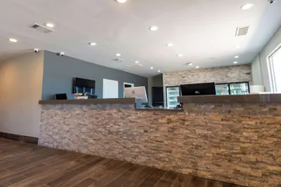 Photo 3 - Magnuson Extended Stay and Suites Airport Hotel