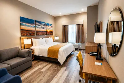 Photo 2 - Days Inn & Suites by Wyndham Tomball Houston NW