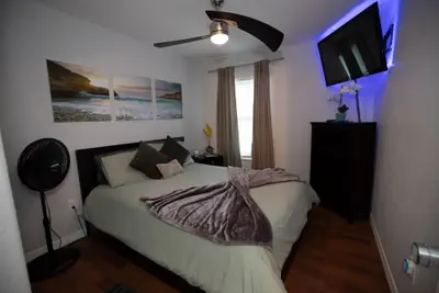 Photo 5 - Gorgeous Urban Oasis W/hot Tub, Heated Pool And Private Movie Theater 3 Bedroom Home by RedAwning