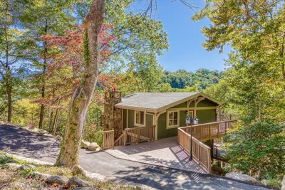 Photo 2 - Gatlinburg Views A Unique Cabin Mountain Views Expansive Decks Adjacent To Gatlinburg & Ski Lodge 1 Bedroom Cabin by RedAwning