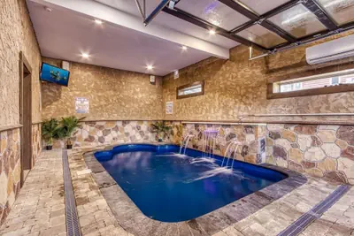 Photo 2 - Ern823 - Eagle Falls - Great Location With Private Heated Indoor Pool! Close To Town! 3 Bedroom Cabin by RedAwning