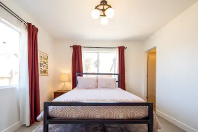 Photo 4 - The Rockhopper - Hot Tub, Fire Pit & Walk To Downtown Jt! 4 Bedroom Home by RedAwning