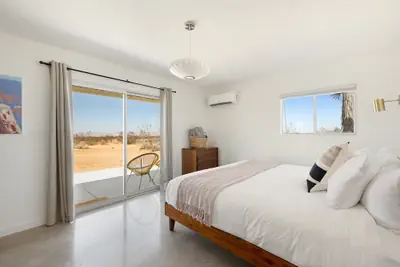Photo 3 - Relax In Style At The Green Jackrabbit - Hot Tub, Record Player 1 Bedroom Home by RedAwning