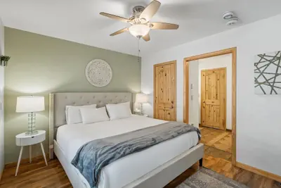 Photo 4 - Modern Comfort River/mtn Views + Hot Tub 1 Bedroom Condo by RedAwning