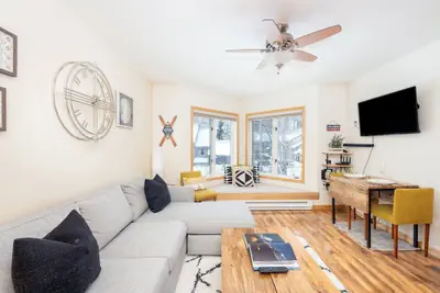 Photo 2 - Modern Comfort River/mtn Views + Hot Tub 1 Bedroom Condo by RedAwning
