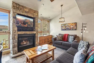 Photo 2 - Lodge Life! Walk Or Shuttle To Lifts + Fireplace, Hot Tub 2 Bedroom Condo by RedAwning