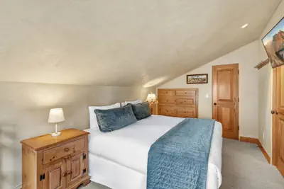 Photo 4 - Lodge Life! Walk Or Shuttle To Lifts + Fireplace, Hot Tub 2 Bedroom Condo by RedAwning