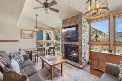 Photo 2 - Lodge Life! Walk Or Shuttle To Lifts + Fireplace, Hot Tub 2 Bedroom Condo by RedAwning